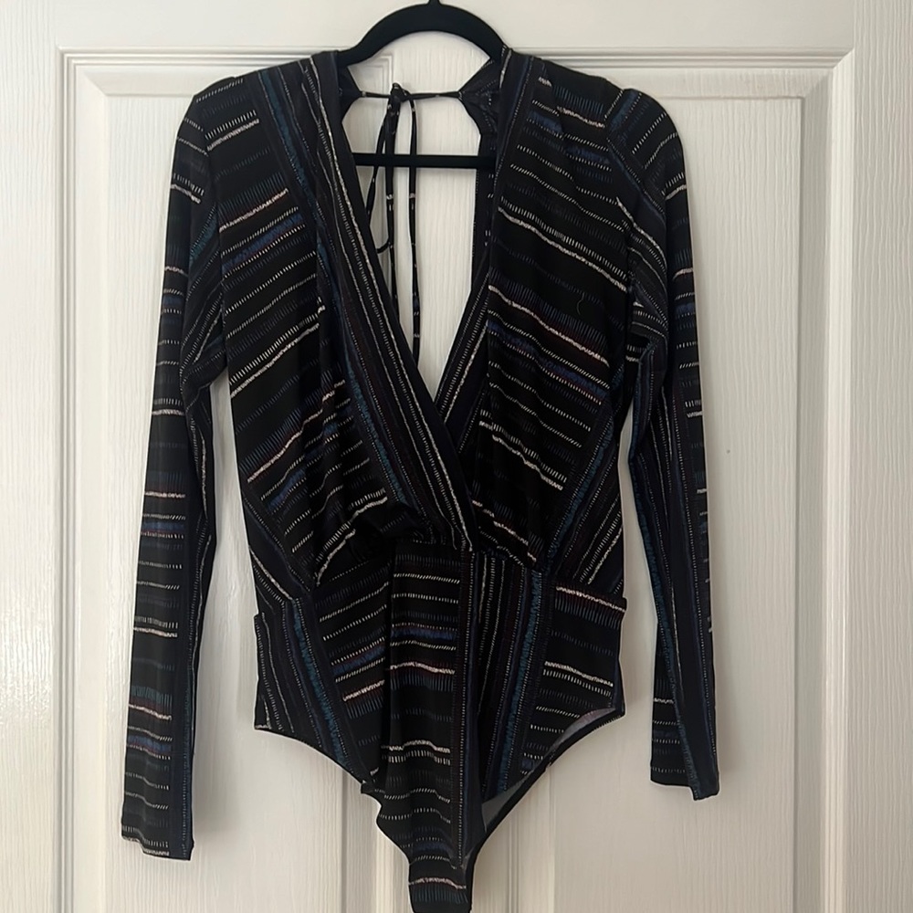 Long sleeved body suit